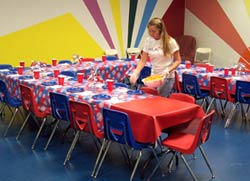 girl setting up a party room